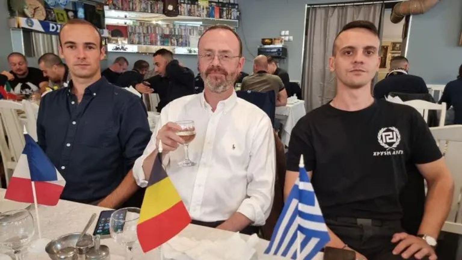 Golden Dawn representative Stefanos Matsiris (right) in the company of far-right figures from Belgium and France at a congress in St. Petersburg.
